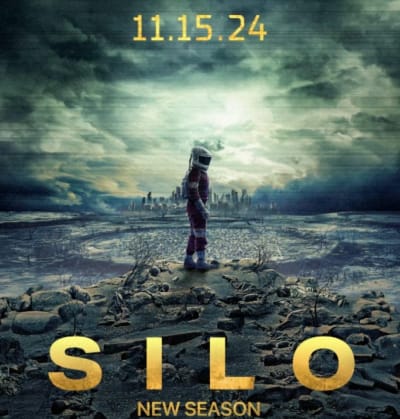 Promotieafbeelding voor seizoen 2 van de Silo serie op Apple TV+, met een personage in een beschermend pak in een dystopisch landschap.