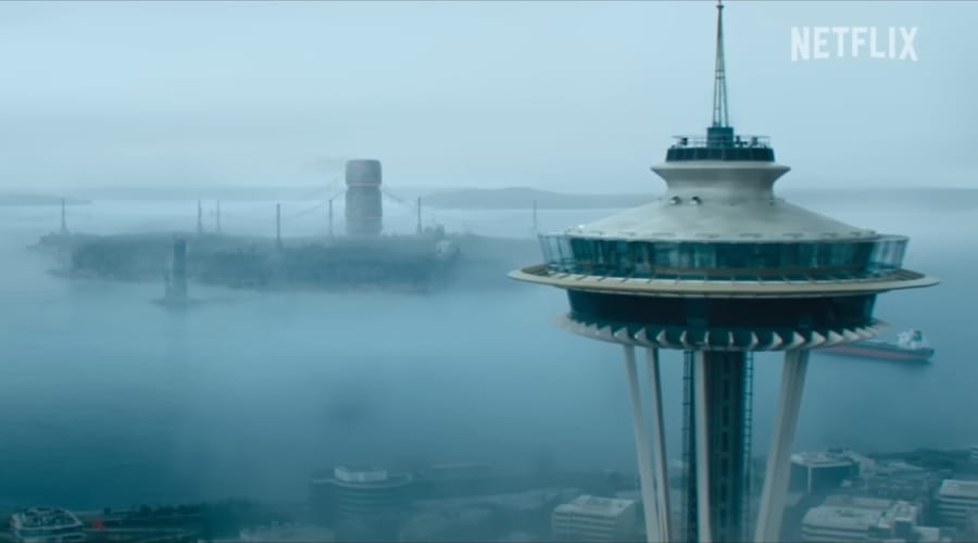 Post-apocalyptisch Seattle in The Electric State op Netflix, met de iconische Space Needle en vervallen bruggen in de achtergrond.