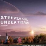 Omslag van het boek Under the Dome van Stephen King met een koepel over een stad.